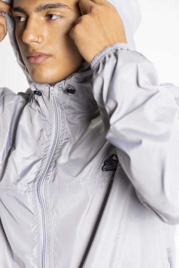 CORTAVIENTOS HOMBRE GRIS CLARO