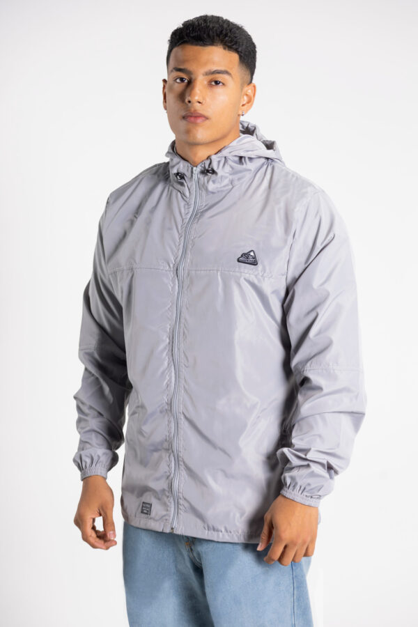 CORTAVIENTOS HOMBRE GRIS CLARO